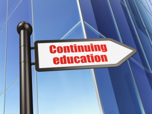 Education concept: sign Continuing Education on Building background